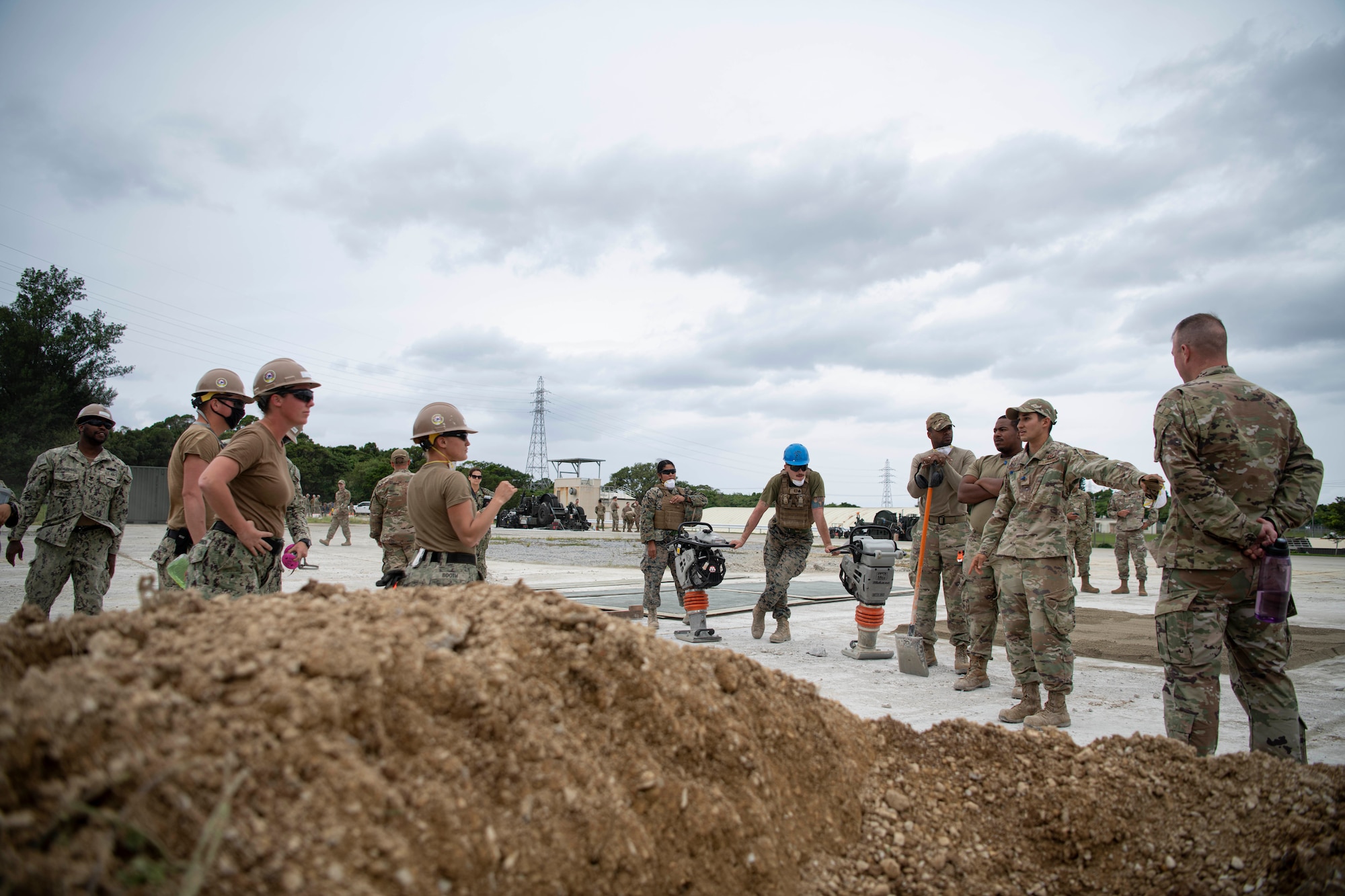 USAF, USMC, USN gather for a briefing.