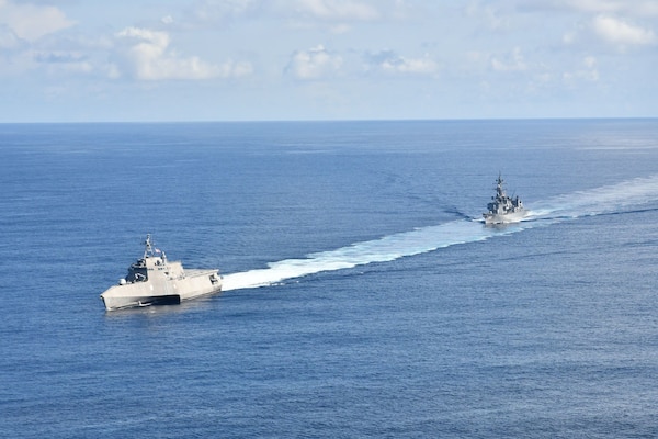 Independence-variant littoral combat ship USS Jackson (LCS 6) and Japan Maritime Self-Defense Force Murasame-class destroyer JS Yudachi (DD 103) sail together in the South China Sea. Jackson, part of Destroyer Squadron Seven, are on a rotational deployment in the U.S. 7th Fleet area of operation to enhance interoperability with partners and serve as a ready-response force in support of a free and open Indo-Pacific region.