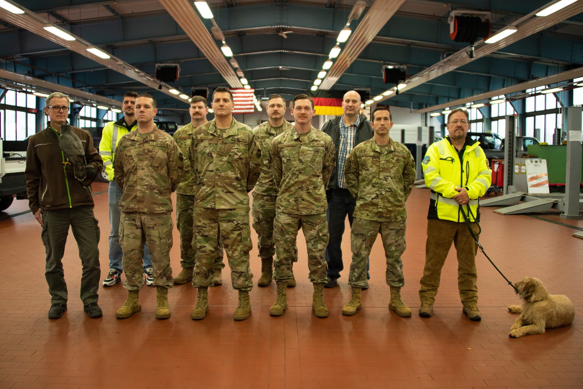 U.S. Air Force members and civilians from the 52nd Fighter Wing Safety Office pose for a group photo at Spangdahlem Air Base, Germany, Oct. 28, 2021. The Wing Safety Office supports many functions in their key role of mishap prevention. (U.S. Air Force photo by Staff Sgt. Chance Nardone)