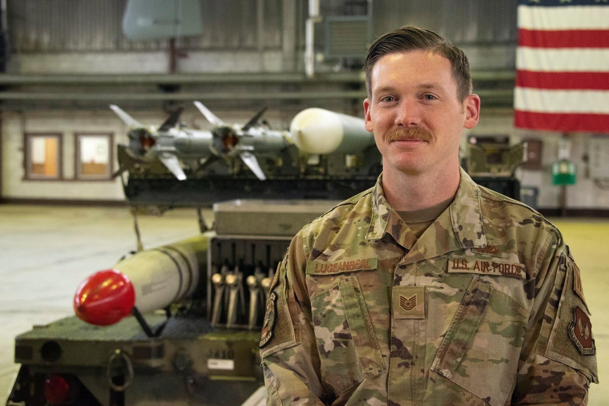 U.S. Air Force Tech. Sgt. Matthew Lugeanbeal, 52nd Fighter Wing Safety Office weapons safety manager, evaluates appropriate explosive safety mitigation strategies at Spangdahlem Air Base, Germany. Weapons safety ensures that a minimum amount of explosives, Airmen and time are used during load operations. (U.S. Air Force photo by Staff Sgt. Chance Nardone)