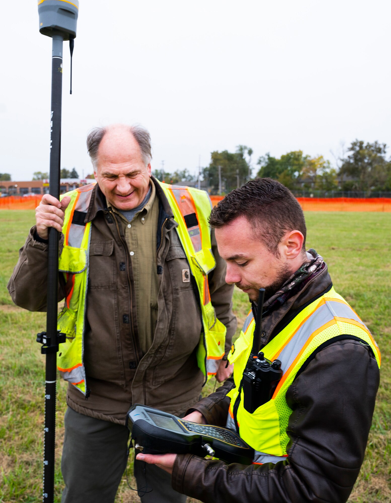 Chris Hess (right) and Patrick Ernst, both with the 88th Civil Engineer Group, measure how far a pumpkin was thrown during the 16th Annual Pumpkin Chuck on Oct. 22, 2021, at Wright-Patterson Air Force Base, Ohio. The chuck was sponsored by the Air Force Life Cycle Management Center’s Engineering Directorate as a STEM event for local schools and organizations. (U.S. Air Force photo by R.J. Oriez)
