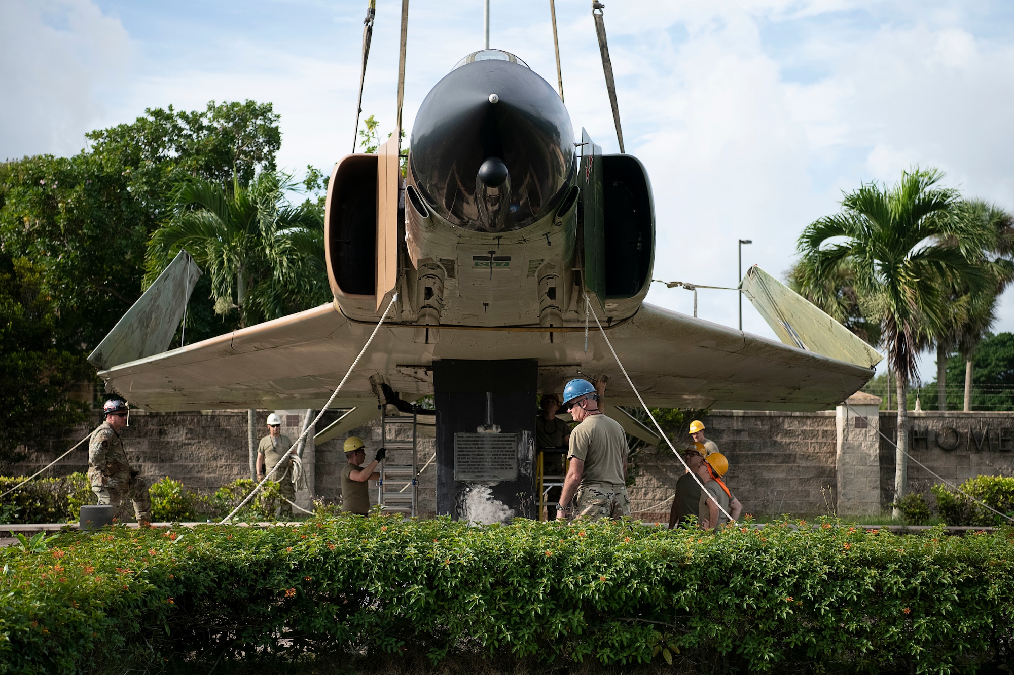 482nd Aircraft Maintenance Squadron personnel prior to load F-4D fighter jet, serial number 66-0267, onto a trailer prior to being transported to the aircraft corrosion control facility at Homestead Air Reserve Base, Fla., on Oct. 28, 2021. The jet is part of a static display at the entrance to HARB. (U.S. Air Force photo by Tim Norton)
