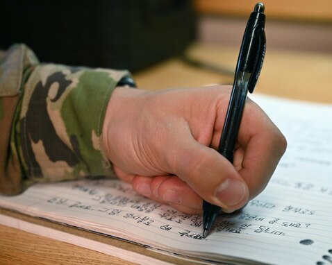 Airman 1st Class Omar Jazaerle writes class notes in Hangul, the written language of Korea Presidio of Monterey, CA., July 23, 2021. Homework is an important part of the curriculum at the Defense Language Institute, helping Airmen study their language outside of the classroom setting. (U.S. Air Force photo by Senior Airman Michael Bowman)
