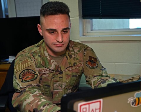 Airman 1st Class Omar Jazaerle finishes his Korean language homework assignment in his dorm room after class at Presidio of Monterey, CA., July 23, 2021. Jazaerle studied Korean as his target language at the Defense Language Institute to become an airborne cryptologic linguist. (U.S. Air Force photo by Senior Airman Michael Bowman)