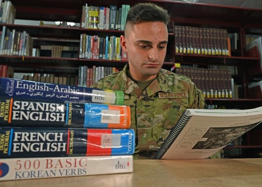Airman 1st Class Omar Jazaerle studies his Korean language workbook at the Aiso Library on Presidio of Monterey, CA., July 23, 2021. Jazaerle learned Korean at the Defense Language Institute as his fifth language. (U.S. Air Force photo by Senior Airman Michael Bowman)