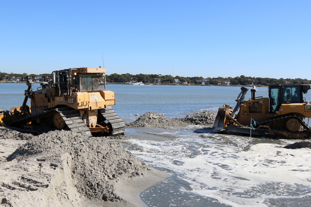 Bulldozers compact dredged material from the Charleston harbor deepening project as it is added to Crab Bank, a 32-acre site of prime nesting habitat for many coastal birds. Prior to 2017, nearly 4,000 nests could be found in a single summer along with thousands of offspring. The island also provided rest and nourishment for hundreds of migrating shorebirds. But wind and waves have taken a toll on this unique resource and Crab Bank is now a tiny fraction of its original size. In 2017, Hurricane Irma washed away most of the remaining high ground, removing any opportunity for nesting birds.