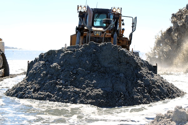 Bulldozers compact dredged material from the Charleston harbor deepening project as it is added to Crab Bank, a 32-acre site of prime nesting habitat for many coastal birds. Prior to 2017, nearly 4,000 nests could be found in a single summer along with thousands of offspring. The island also provided rest and nourishment for hundreds of migrating shorebirds. But wind and waves have taken a toll on this unique resource and Crab Bank is now a tiny fraction of its original size. In 2017, Hurricane Irma washed away most of the remaining high ground, removing any opportunity for nesting birds.