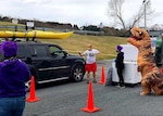 Base Kodiak's Morale, Well-Being and Recreation staff are pictured in April 2020 during their monthly free ice cream giveaway for Coast Guard families. COVID protocols were in place to avoid close contact during the monthly giveaways in the spring and summer. The event was turned into an ice cream drive-through and 363 families were served.