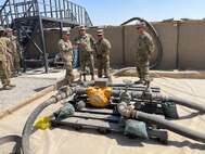 The commander and command sergeant major for the 401st Army Field Support Brigade traveled to the brigade's installations in Iraq to meet with their military and civilian personnel deployed there.