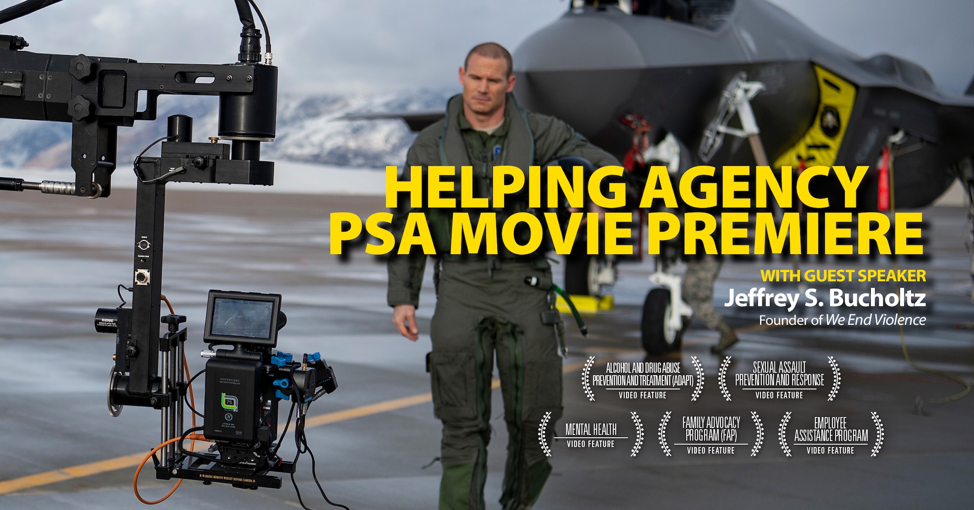 "Helping Agency PSA  Movie Premiere" over the image of an actor wearing a flight suit being filmed in front of an F-35A.