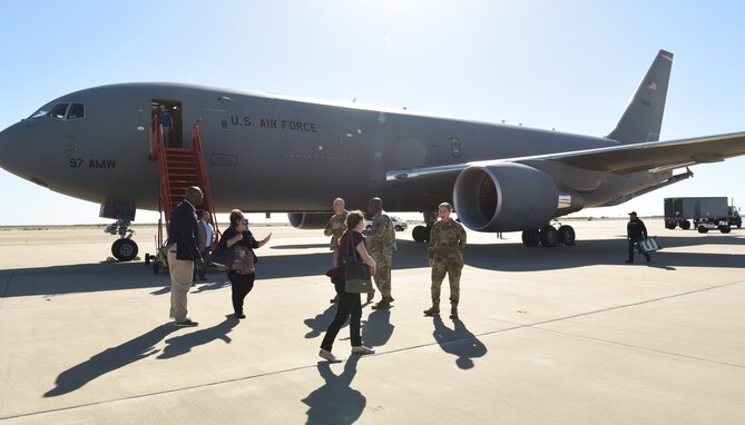 U.S. Air Force Col. Matthew Reilman, 17th Training Wing commander, and members of the 17th Training Wing greet the arriving members of the Air Education and Training Command’s Civic Leader Program, at the San Angelo Regional Airport, Texas, Oct. 27, 2021. The AETC’s Civic Leader Program toured Goodfellow Air Force Base to experience the transformation of training and community partnerships at the installation.