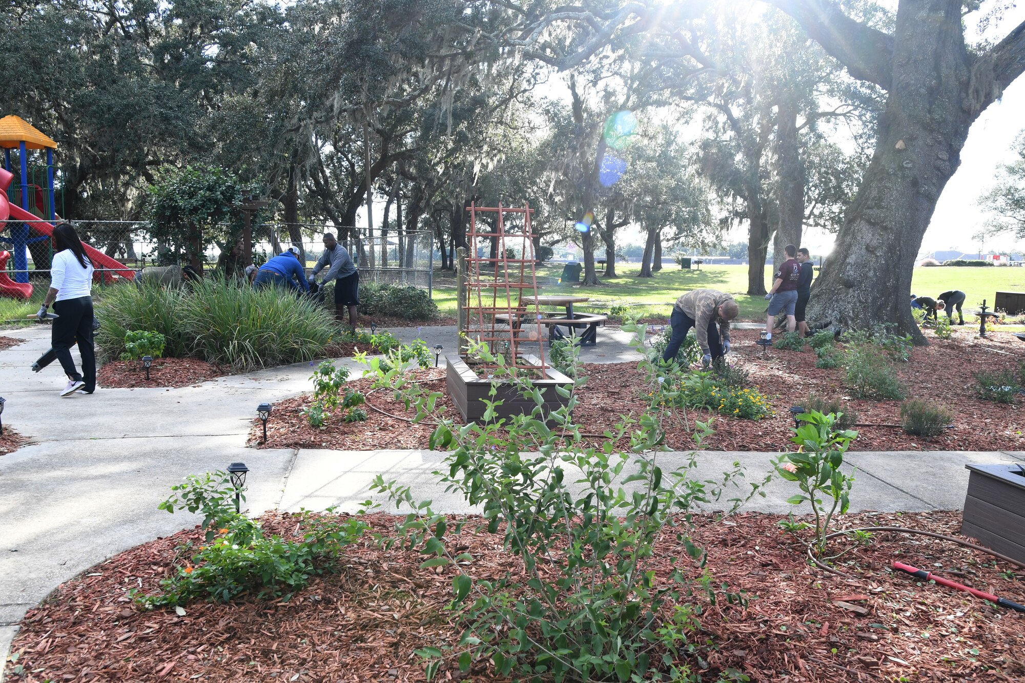 Keesler Airmen participate in Base Cleanup Day at the marina park at Keesler Air Force Base, Mississippi, Oct. 29, 2021. Base leadership joined Airmen to clean up around the base to inspire beautification. (U.S. Air Force photo by Kemberly Groue)