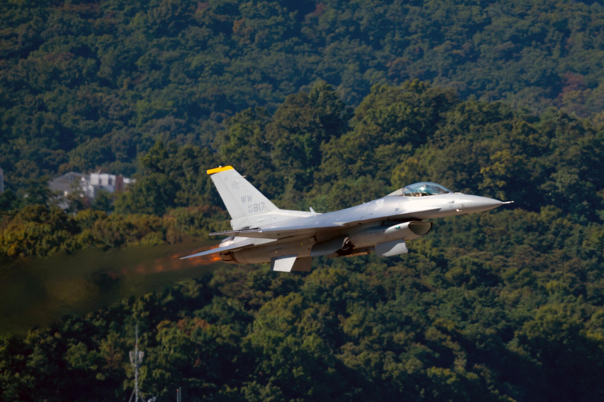A U.S. Air Force F-16 Fighting Falcon soars through the air above Seoul, South Korea.