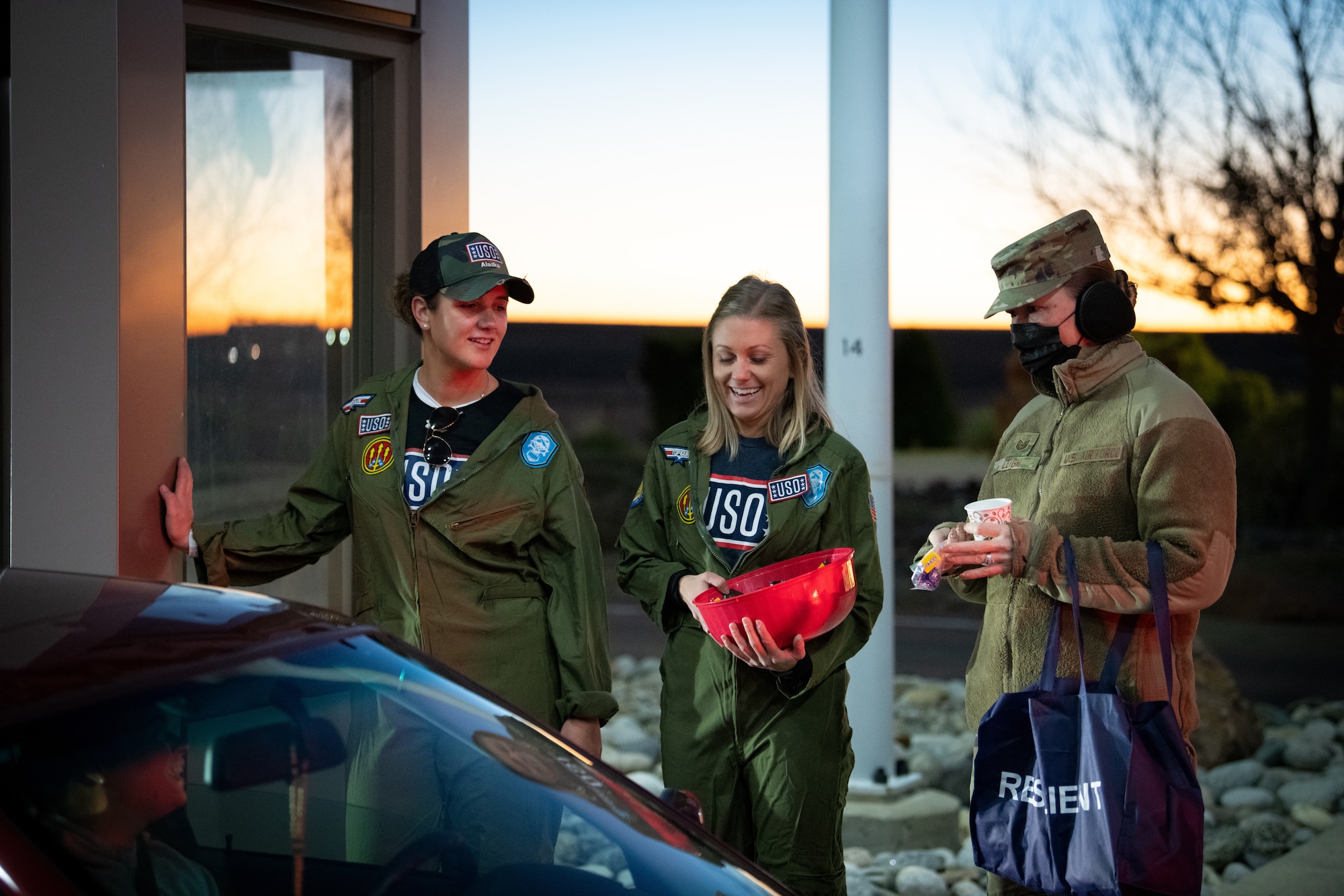 People hand out candy
