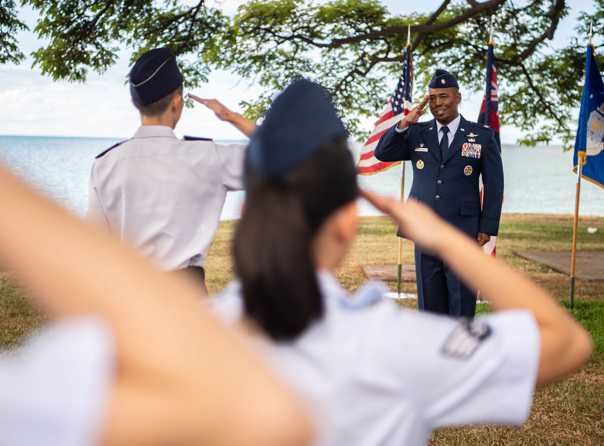 Lt. Col. Michael Brewer, 747th Cyberspace Squadron commander, receives his first salute as the 747th CYS commander during a redesignation ceremony at JBPHH, Hawaii, Oct. 29, 2021. The 747th CYS is the Air Force’s first operational cyberspace squadron. (U.S. Air Force photo by Senior Airman Alan Ricker)
