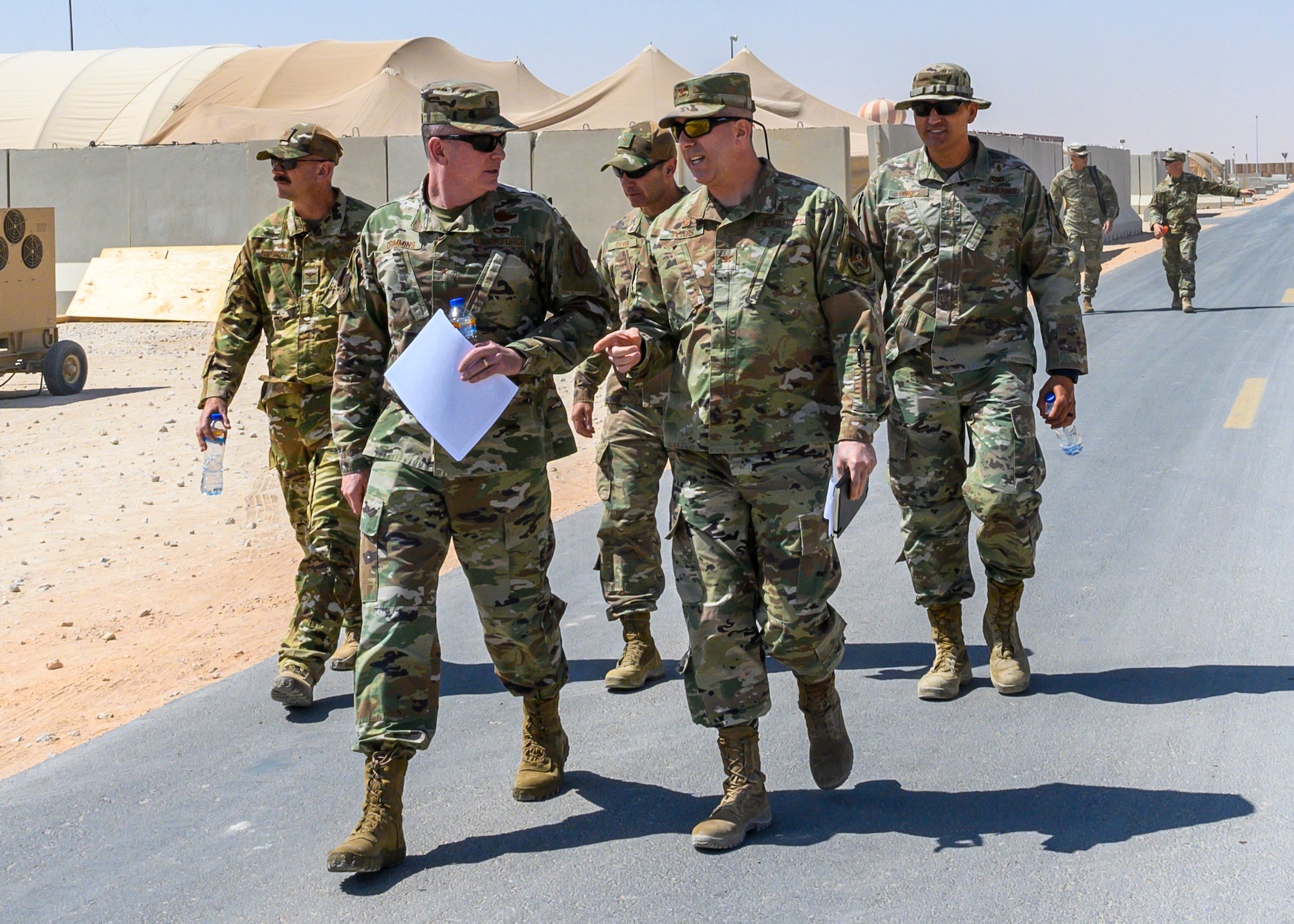 U.S. Air Force Brig. Gen. Thomas Crimmins, Senior Defense Official and Defense Attaché at the Embassy of the United States, Kingdom of Saudi Arabia and U.S. Air Force Col. Wayne Peters, 378th Expeditionary Medical Group commander, discuss the capabilities of the 378th EMDG medical clinic at Prince Sultan Air Base, KSA, Oct. 12, 2021. Crimmins visited PSAB for the first time since assuming the SDO role in September, meeting with various personnel to learn about defense efforts and expanding capabilities on base. (U.S. Air Force photo by Senior Airman Samuel Earick)