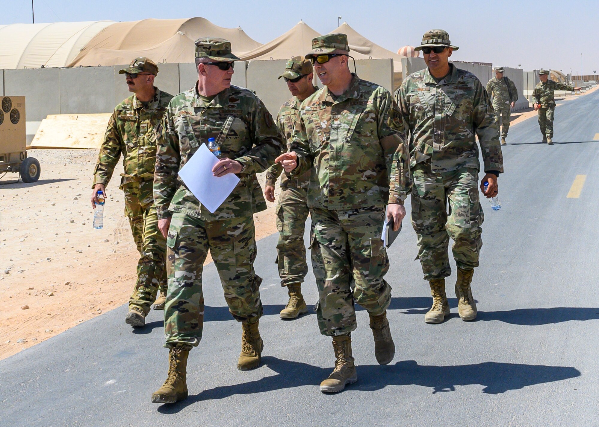 U.S. Air Force Brig. Gen. Thomas Crimmins, Senior Defense Official and Defense Attaché at the Embassy of the United States, Kingdom of Saudi Arabia and U.S. Air Force Col. Wayne Peters, 378th Expeditionary Medical Group commander, discuss the capabilities of the 378th EMDG medical clinic at Prince Sultan Air Base, KSA, Oct. 12, 2021. Crimmins visited PSAB for the first time since assuming the SDO role in September, meeting with various personnel to learn about defense efforts and expanding capabilities on base. (U.S. Air Force photo by Senior Airman Samuel Earick)