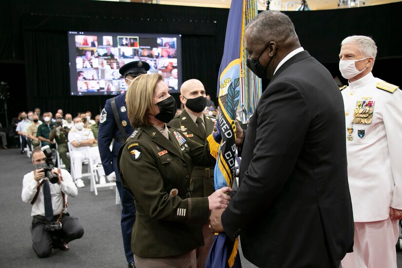 U.S. Army Gen. Laura J. Richardson, incoming commander of U.S. Southern Command, assumes command from U.S. Secretary of Defense Lloyd J. Austin during the SOUTHCOM change of command ceremony at SOUTHCOM Headquarters in Doral, Florida, Oct. 29, 2021.