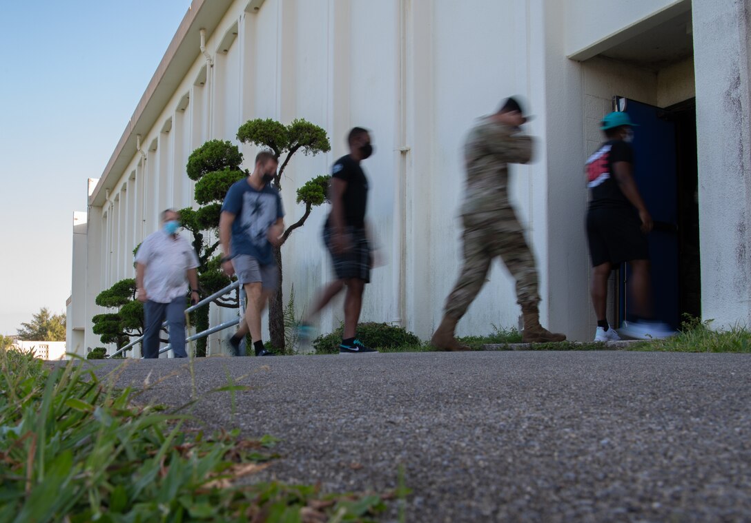 18th Medical Group technicians continue screening members of Kadena for COVID-19.