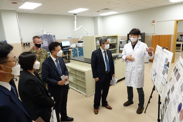 Senior leaders from the Korea Institute of Civil Engineering and Building Technology (KICT) tour the U.S. Army Corps of Engineers Far East District’s Geotechnical and Environmental Engineering Branch laboratories, Aug. 27. Kim Kyong-ho (right), an FED chemist, briefs KICT senior leaders, during their visit.