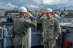 (Aug 31, 2021) Capt. Daniel Prochazka, commanding officer of the Blue Ridge-class command and control ship USS Mount Whitney (LCC 20) salutes Vice Adm. Gene Black, commander, U.S. Sixth Fleet, during the ship’s change of command in San Giorgio Del Porto in Genoa, Italy, August, 31, 2021.  Mount Whitney, the U.S. Sixth Fleet flagship, homeported in Gaeta, Italy entered its regularly scheduled overhaul to make improvements in order to increase the security and stability of the U.S. Sixth Fleet area of operations.