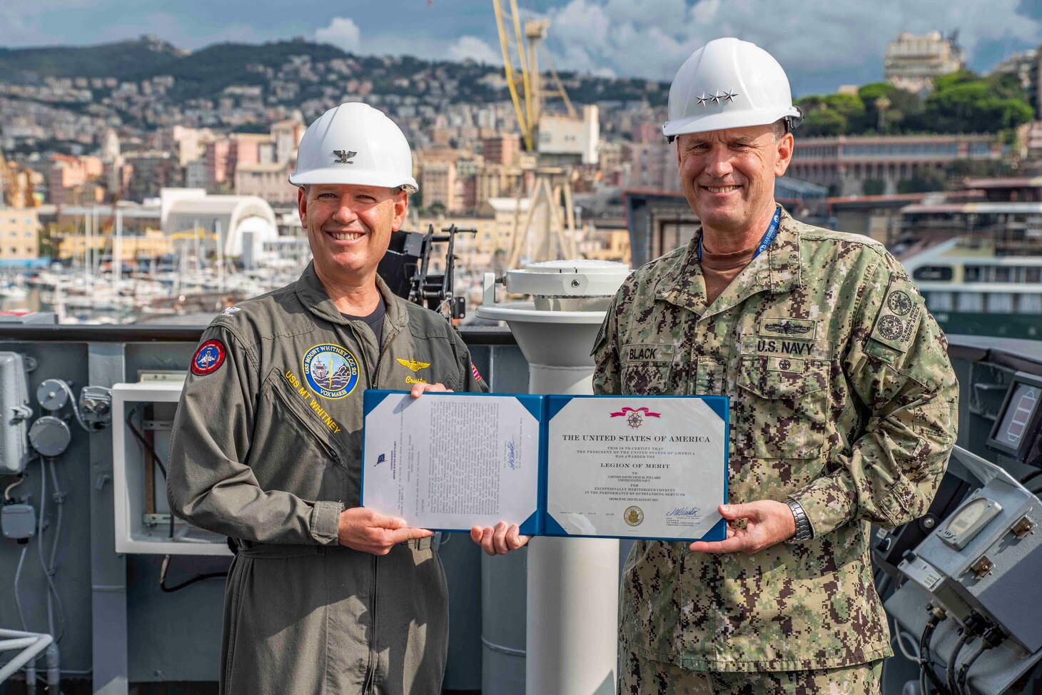 (Aug 31, 2021) Vice Adm. Gene Black, commander, U.S. Sixth Fleet, presents Capt. David Pollard, commanding officer of the Blue Ridge-class command and control ship USS Mount Whitney (LCC 20), with an award during the ship’s change of command in San Giorgio Del Porto in Genoa, Italy, August, 31, 2021.  Mount Whitney, the U.S. Sixth Fleet flagship, homeported in Gaeta, Italy entered its regularly scheduled overhaul to make improvements in order to increase the security and stability of the U.S. Sixth Fleet area of operations.