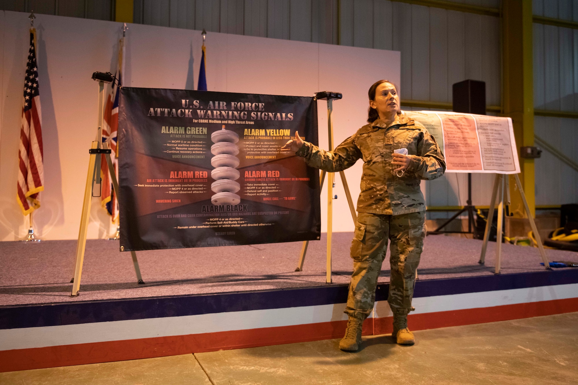 U.S. Air Force Master Sgt. Terri Adams, 423rd Civil Engineering Squadron NCO in charge of emergency management, briefs Airmen from the 501st Combat Support Wing during Ability to Survive and Operate training at RAF Alconbury, England, Aug. 26, 2021. The ATSO rodeo was designed to reinforce Airmen’s ability to properly utilize their MOPP gear in a potential chemical environment. (U.S. Air Force photo by Senior Airman Jennifer Zima)
