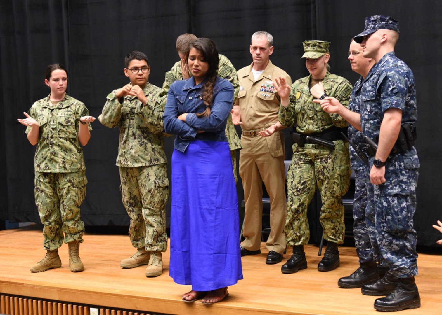 CHINHAE, Republic of Korea, (June 19, 2015) Sailors from Commander. Naval Forces Korea participate with actor Briza Covarrubias of the acting troupe InterACT during a Sexual Assault Prevention and Response training scenario at Commander, Fleet Activities Chinhae. (U.S. Navy photo by Mass Communication Specialist 1st Class Abraham Essenmacher/Released)