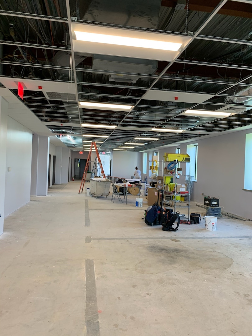 empty office with new walls and paint construction starting.