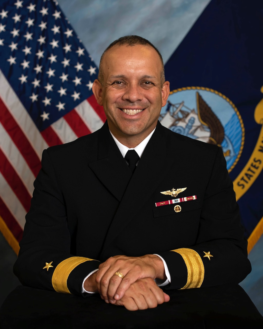 Official studio portrait of Rear Adm. John Menoni, Commander, Expeditionary Strike Group Two