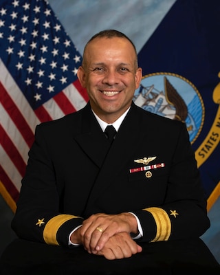 Official studio portrait of Rear Adm. John Menoni, Commander, Expeditionary Strike Group Two