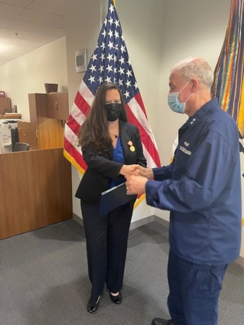 Wendy Chaves, head of the Office of Research, Development, Test & Evaluation and Innovation was presented a Coast Guard Civilian Service Commendation Medal by Rear Adm. J.M. Kelly for her work to establish a Coast Guard detachment at the Defense Innovation Unit (DIU) July 28, 2021.