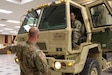 Spc. Justin Love, a utilities equipment repairer and Sgt. Joshua Watkins, a construction equipment repairer, both with the 3622nd Support Maintenance Company, 728th Combat Sustainment Support Battalion, 213th Regional Support Group, Pennsylvania Army National Guard, check the lights on one of the eight high-clearance vehicles their unit has readied to respond to Tropical Storm Ida Sept. 1 at Fort Indiantown Gap. About 120 Pennsylvania National Guard members total with approximately 35 vehicles have been placed on state active duty and are on stand-by as Ida bears down on Pennsylvania. (U.S. Army National Guard photo by Staff Sgt. Zane Craig)