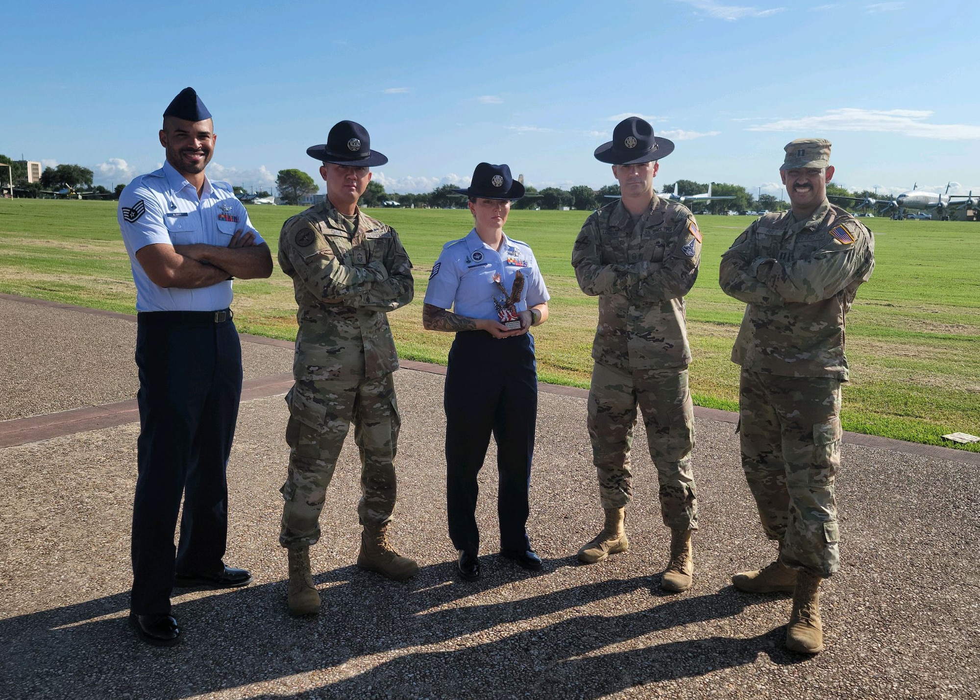 Sgt. Michelle Holt, center, poses for a photo with two fellow U.S. Space Force military training instructors on August 6, 2020, at Lackland Air Force Base, Texas.