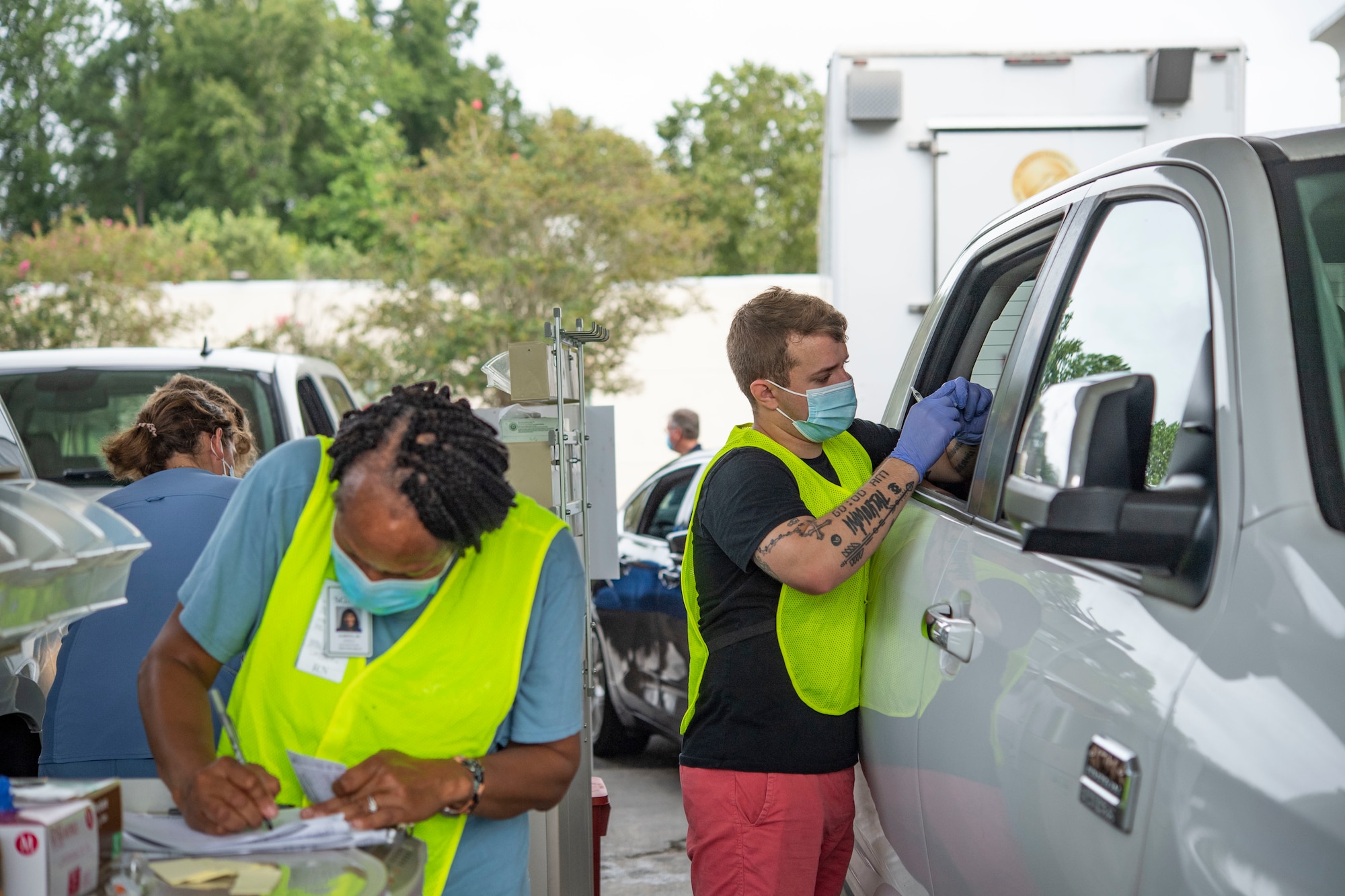 A photo of Airman and staff working.