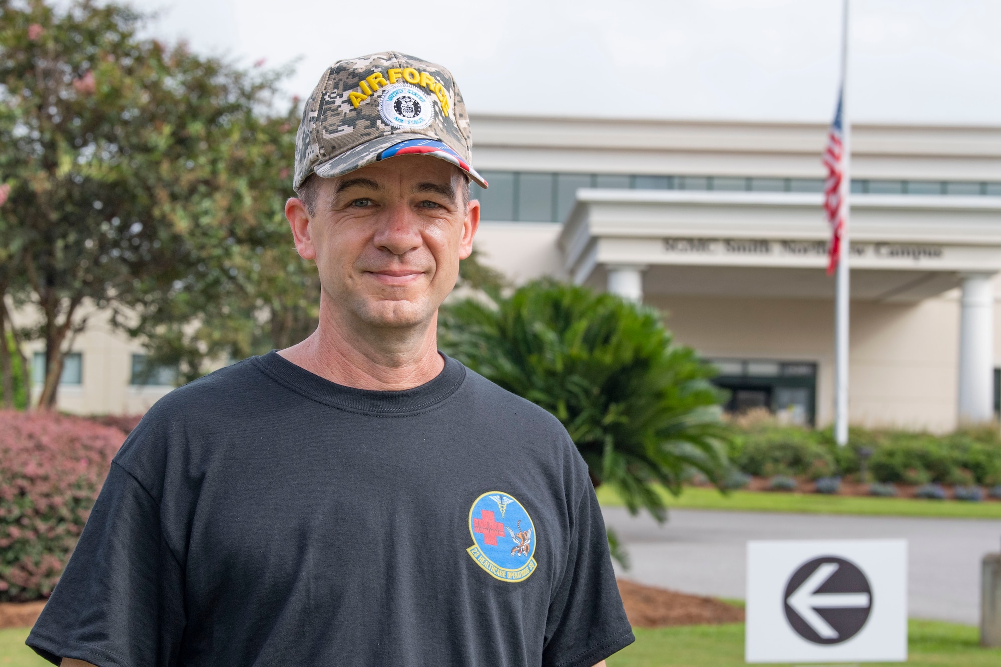 A photo of an Airman smiling.