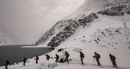 U.S. Army 10th Mountain Division Soldiers, alongside their Chilean Army partners, cross-country ski during Exercise Southern Vanguard 2021 (SV21) near Portillo Lake Portillo, Chile, Aug. 24, 2021. Developed by U.S. Army South, SV21 is a two-week combined high altitude, cold weather training exercise between U.S. and Chilean army forces to increase collaboration, enhance interoperability, and assist in building partner nation capacity. (U.S. Army photos by Pfc. Joshua Taeckens)