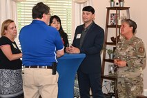 Col. Katrina Stephens, installation commander, hosts members of the Bedford and Lincoln school districts during a community social at Hanscom Air Force Base, Mass., Aug. 23.