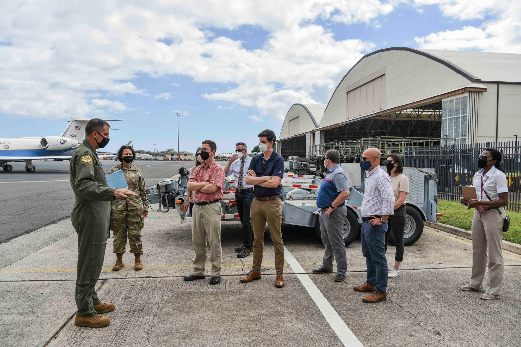 U.S. Air Force Col. Daniel Dobbels, 15th Wing commander, discusses the partnership with the Daniel K. Inouye International Airport and the importance of the shared use airfield with U.S. staff delegation members of the House Appropriations Committee while visiting Airmen at Joint Base Pearl Harbor-Hickam, Hawaii, Aug. 19, 2021. The purpose of the visit was to see how the 15th Wing and Hawaiian Air National Guard utilize Total Force Integration to accomplish the mission to ensure a free and open Indo-Pacific. (U.S. Air Force photo by Tech. Sgt. Anthony Nelson Jr.)