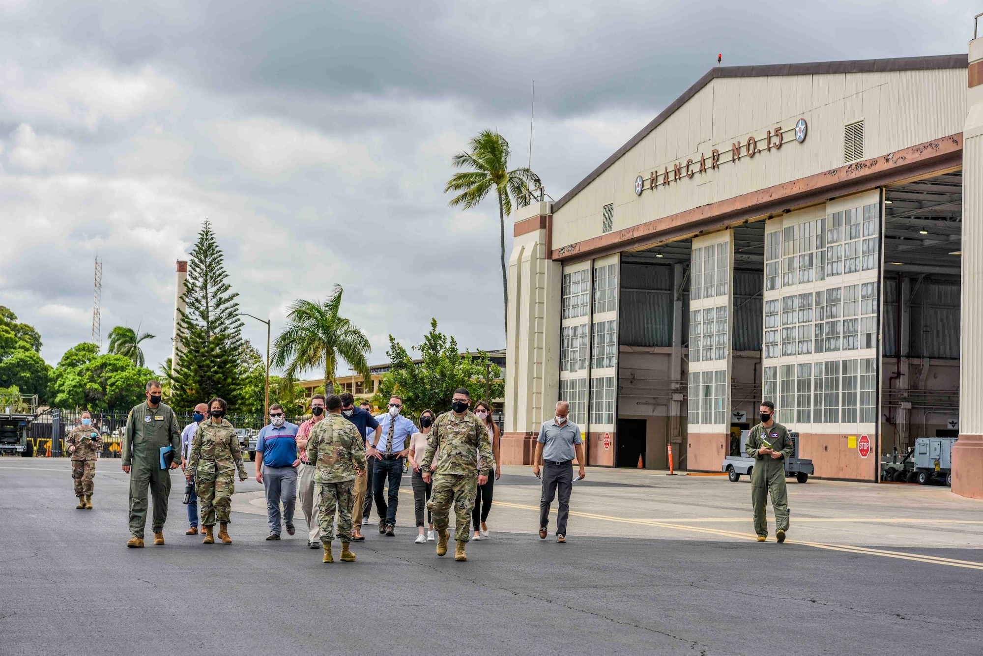 Staff delegation members of the House Appropriations Committee visit with Airmen from the 15th Wing at Joint Base Pearl Harbor-Hickam, Hawaii, Aug. 19, 2021. The purpose of the visit was to see how the 15th Wing and Hawaiian Air National Guard utilize Total Force Integration to accomplish the mission to ensure a free and open Indo-Pacific. (U.S. Air Force photo by Tech. Sgt. Anthony Nelson Jr.)