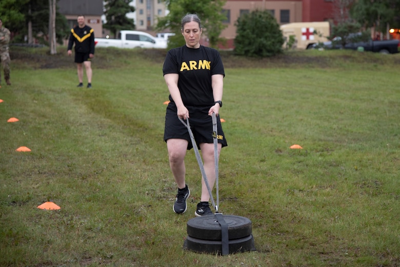 Maj. Virginia Brickner, deputy commander for the U.S. Army Corps of Engineers – Alaska District, pulls a 90-pound sled during the sprint-drag-carry portion of the Army Combat Fitness Test on Aug. 17 at Joint Base Elmendorf Richardson.