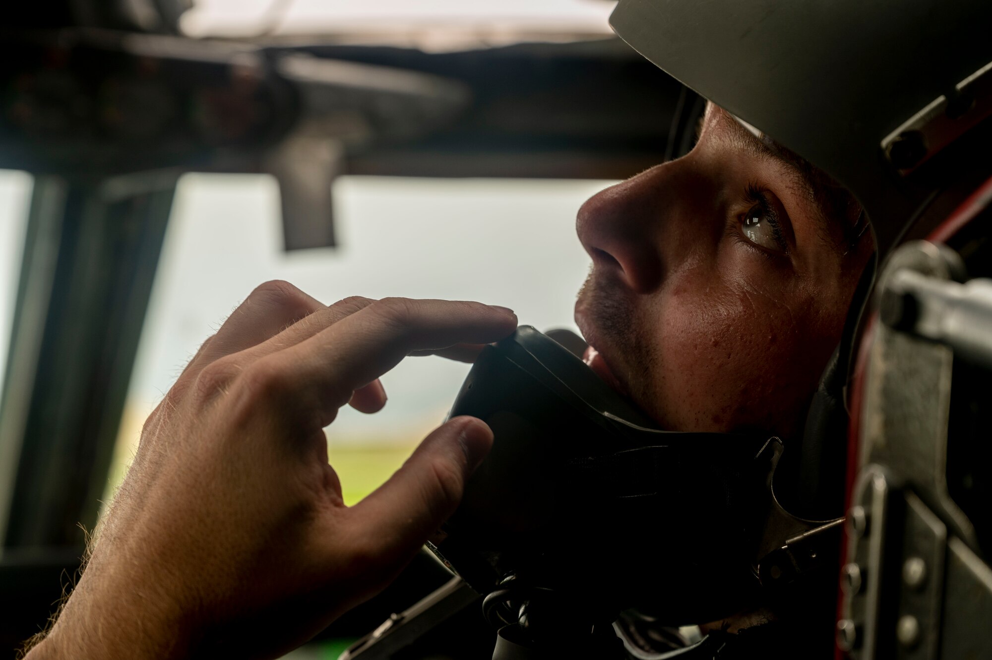 A U.S. Air Force B-52 Stratofortress aircrew member assigned to the 20th Bomb Squadron, Barksdale Air Force Base, Louisiana, prepares to take off August 31, 2021, at Andersen Air Force Base, Guam. This deployment allows aircrew and support personnel to conduct theater integration and to improve bomber interoperability with allies and partners. (U.S. Air Force photo by Senior Airman Charles T. Fultz)