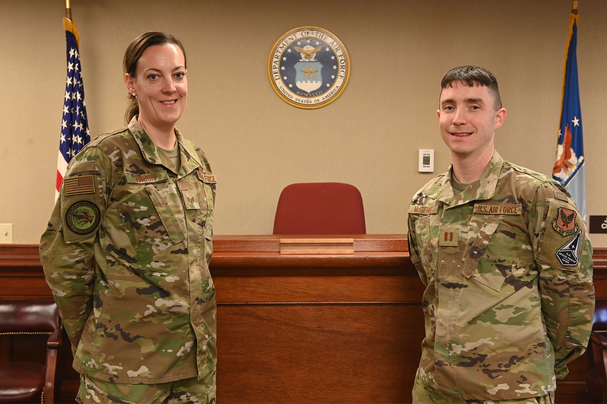 Capt. James McGehee, Malmstrom Air Force Base special victims’ counsel, right, and Staff Sgt. Olga Vinson, Malmstrom AFB paralegal, pose for a photo inside of the courtroom at Malmstrom AFB, Mont. The SVC is a military attorney and paralegal team who operate outside of the installation’s chain of command to represent victims of sexual assault, sexual harassment and interpersonal violence. (U.S. Air Force photo by Airman Elijah Van Zandt)
