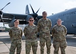 Master Sgt. Megan Hayden, 2nd Lt. Kyra Traino, Airman 1st Class Tobias Frank, and Staff Sgt. Maya Hurley, all of the C-130 Weapons System Management Flight at Scott Air Force Base, Ill., stand in front of a WC-130J assigned to the 53rd Weather Reconnaissance Squadron at Keesler Air Force Base, Miss., prior to an incentive flight Aug. 25, 2021. The 32-person flight oversees parts accessioning for 454 C-130Js in 59 locations across the globe. (U.S. Air Force photo by Staff Sgt. Kristen Pittman)