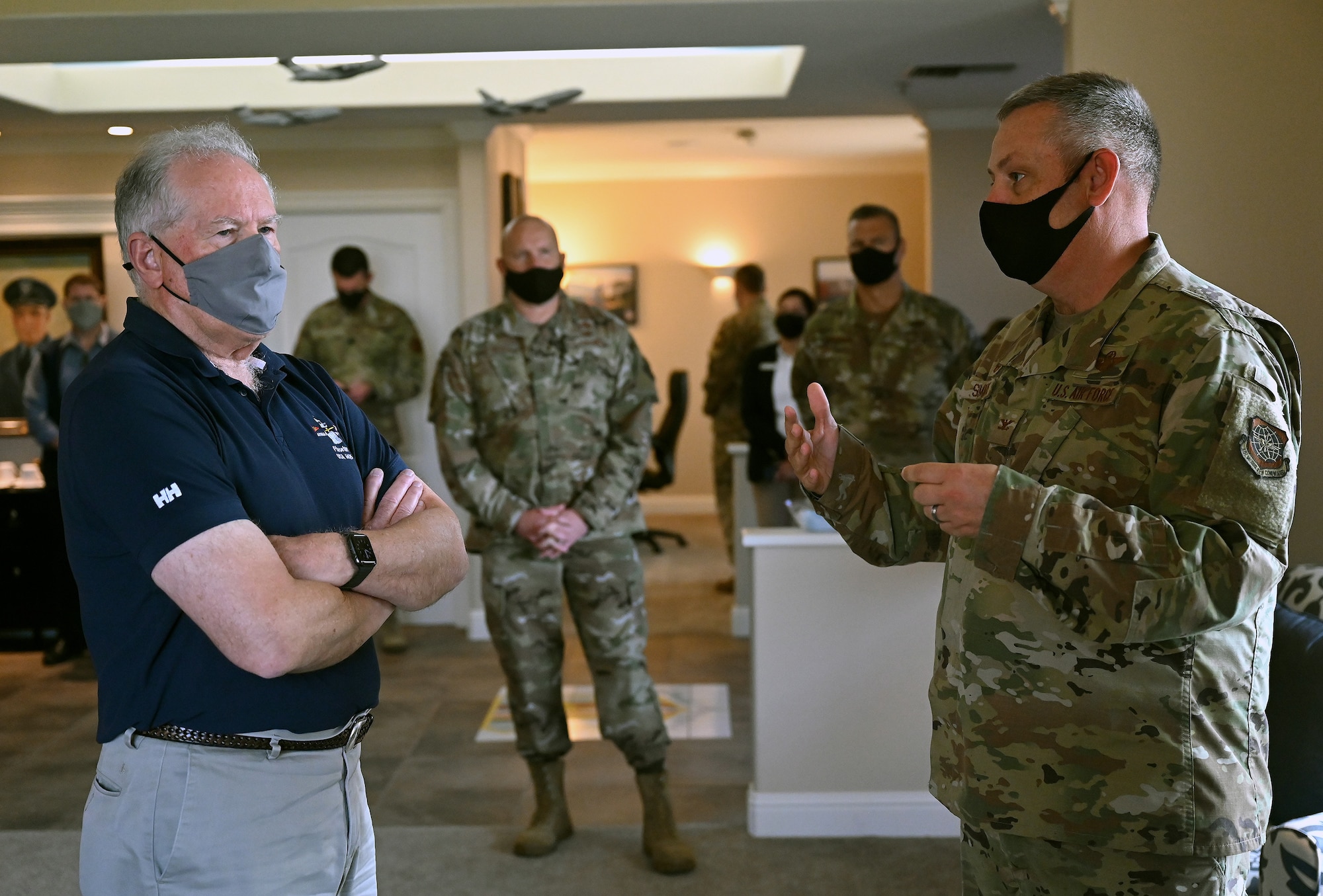 Secretary of the Air Force Frank Kendall is briefed by Col. Corey Simmons, 60th Air Mobility commander on the Travis Air Force Base mission at Travis AFB, Calif., Aug. 16, 2021. Kendall made a stop at Travis AFB and was greeted by wing leadership. (U.S. Air Force photo by Wayne Clark)