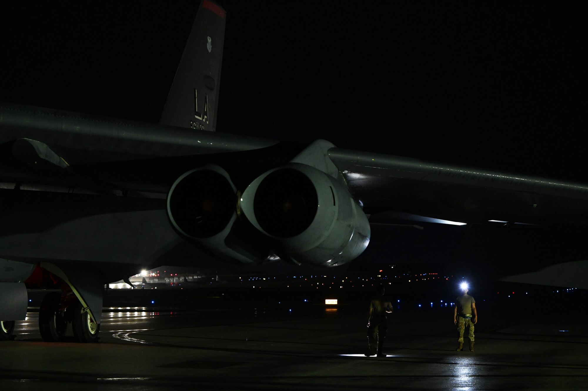 U.S. Air Force Airmen from the 20th Aircraft Maintenance Unit, Barksdale Air Force Base, Louisiana, inspect a B-52 Stratofortress upon arrival at Andersen Air Force Base, Guam, Aug. 26, 2021. This deployment allows aircrews and support personnel to conduct theater integration and to improve bomber interoperability with allies and partners. (U.S. Air Force photo by Staff Sgt. Alysia Blake)