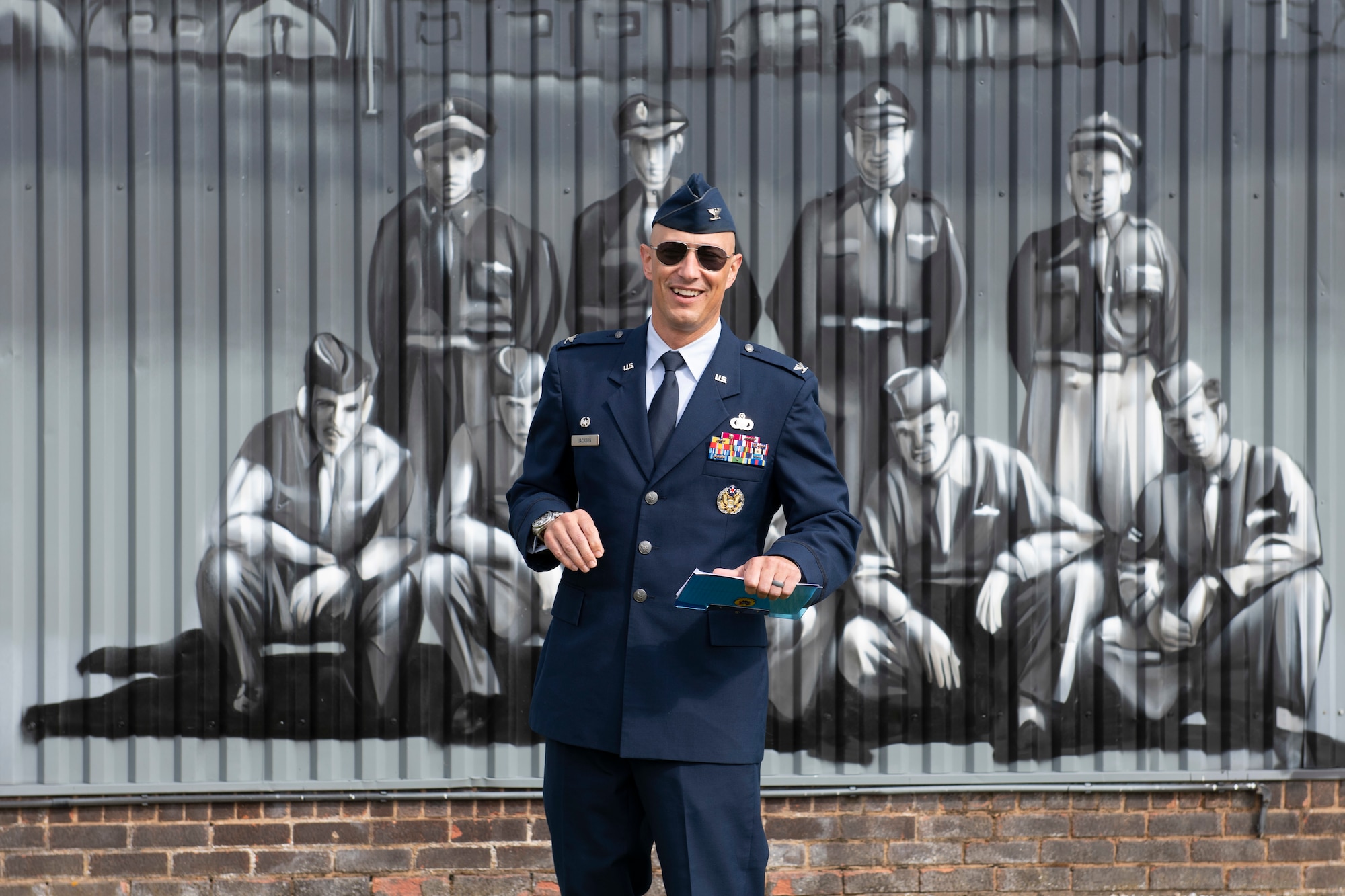 U.S. Air Force Col. Abe Jackson, U.S. European Command Joint Intelligence Operations Center Europe Analytic Center commander, worked with the staff of the Flying Club Conington at Peterborough Conington Airfield, to commemorate the 457th Bombardment Group Airmen who served and flew missions from a World War II base, RAF Glatton, England, Aug. 19, 2021. (U.S. Air Force photo by Senior Airman Jennifer Zima)