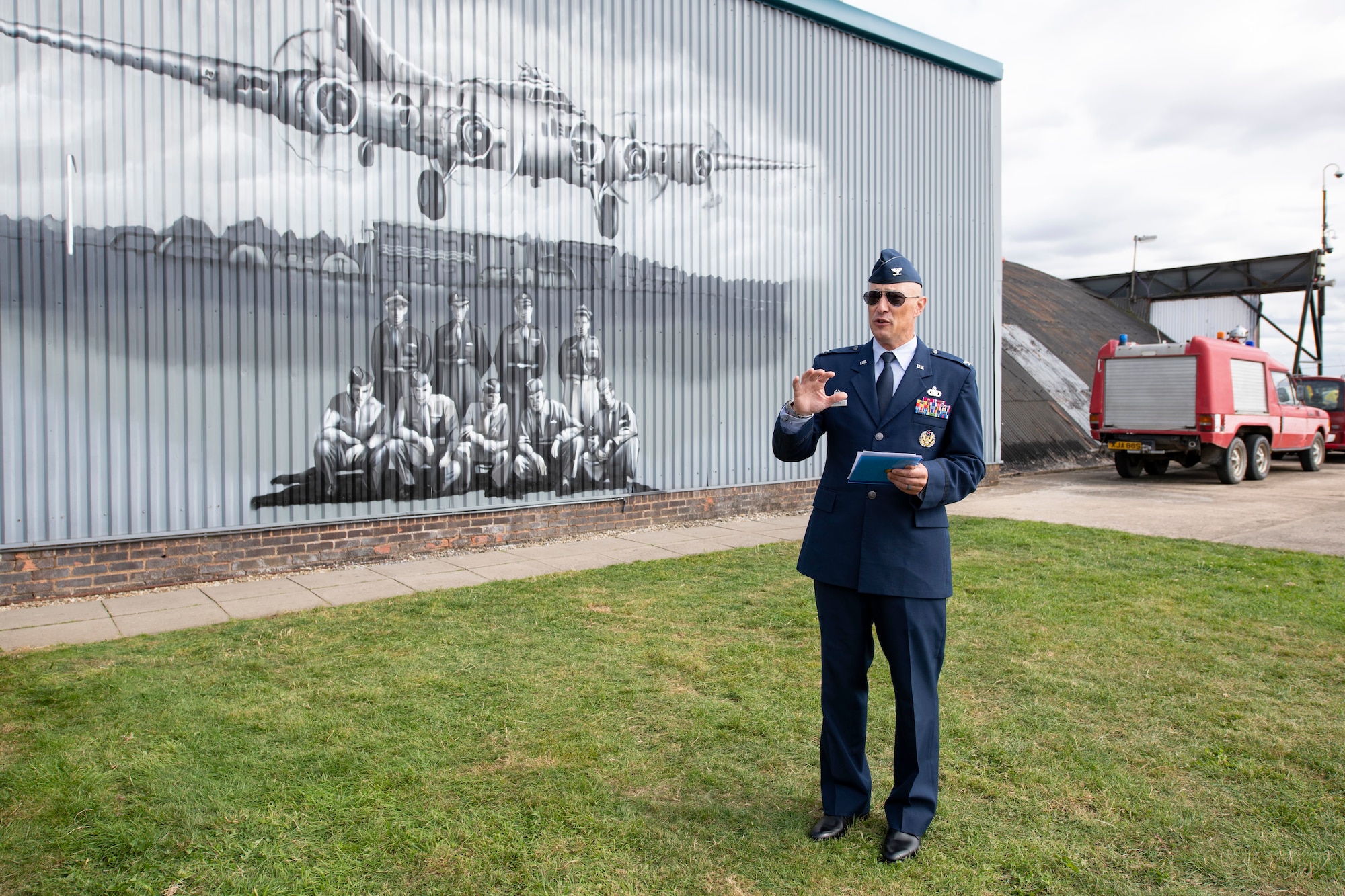 U.S. Air Force Col. Abe Jackson, U.S. European Command Joint Intelligence Operations Center Europe Analytic Center commander, worked with the staff of the Flying Club Conington at Peterborough Conington Airfield, to commemorate the 457th Bombardment Group Airmen who served and flew missions from a World War II base, RAF Glatton, England, Aug. 19, 2021. (U.S. Air Force photo by Senior Airman Jennifer Zima)