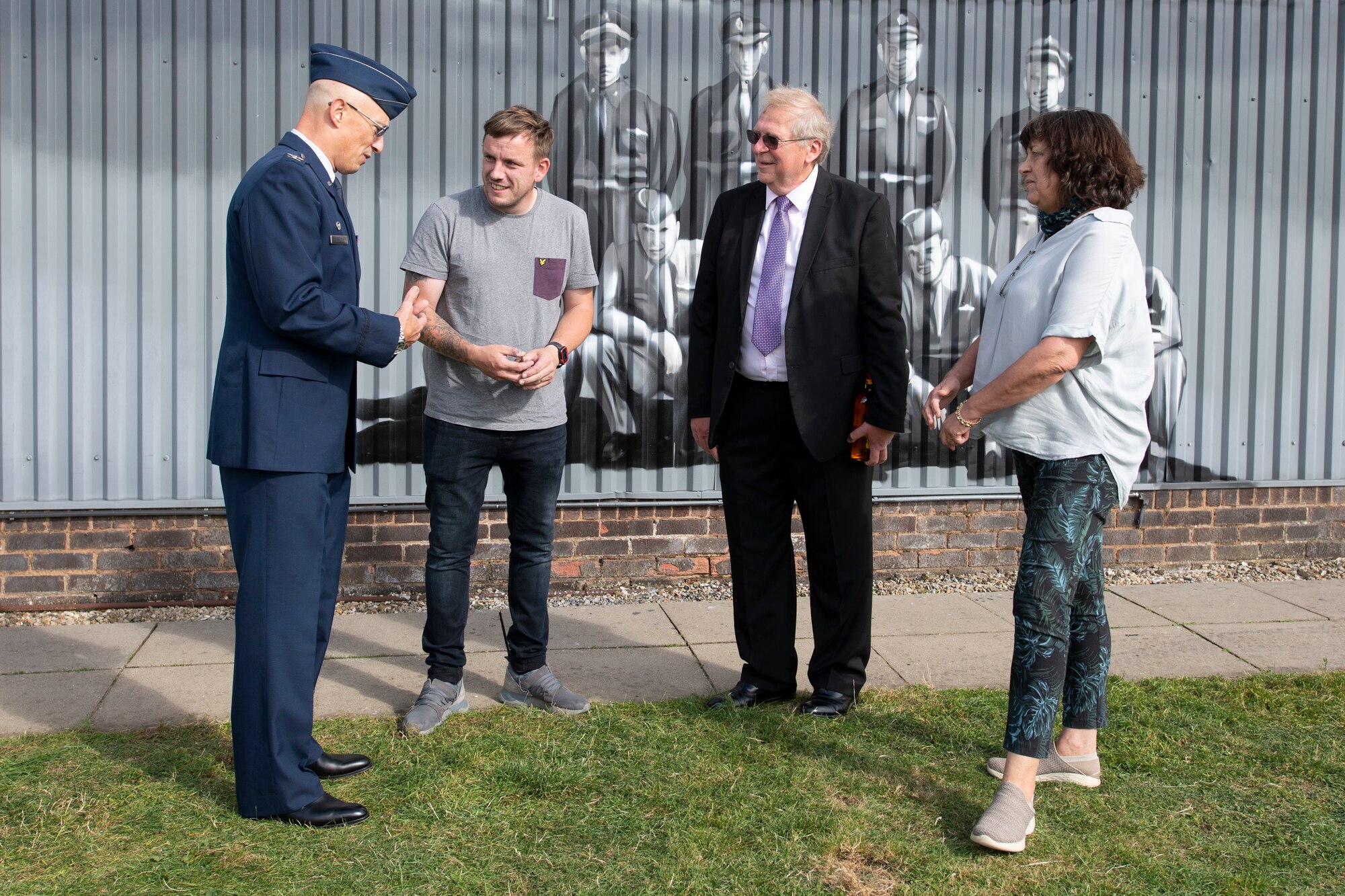 U.S. Air Force Col. Abe Jackson, U.S. European Command Joint Intelligence Operations Center Europe Analytic Center commander, worked with the staff of the Flying Club Conington at Peterborough Conington Airfield, to commemorate the 457th Bombardment Group Airmen who served and flew missions from a World War II base, RAF Glatton, England, Aug. 19, 2021. (U.S. Air Force photo by Senior Airman Jennifer Zima)