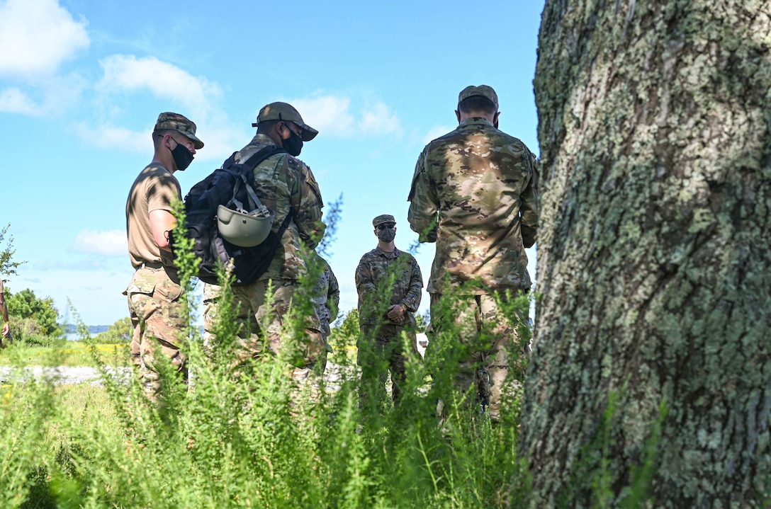 U.S. Air Force Airmen from the 633d Civil Engineer Squadron, create plans during joint tactical convoy operations training at Joint Base Langley-Eustis, Virginia, August 19, 2021. Army Soldiers assigned to the 149th Seaport Operations Company, 7th Transportation Brigade, instructed Airmen on the different aspects of convoy procedures and safety. (U.S. Air Force photo by Senior Airman Sarah Dowe)